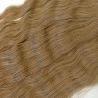 Shade No. 4 natural wavy K-tip hair extensions by Maven & Mane